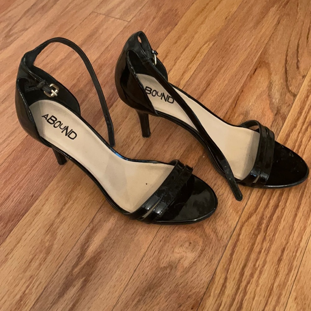 Strappy black patent heel